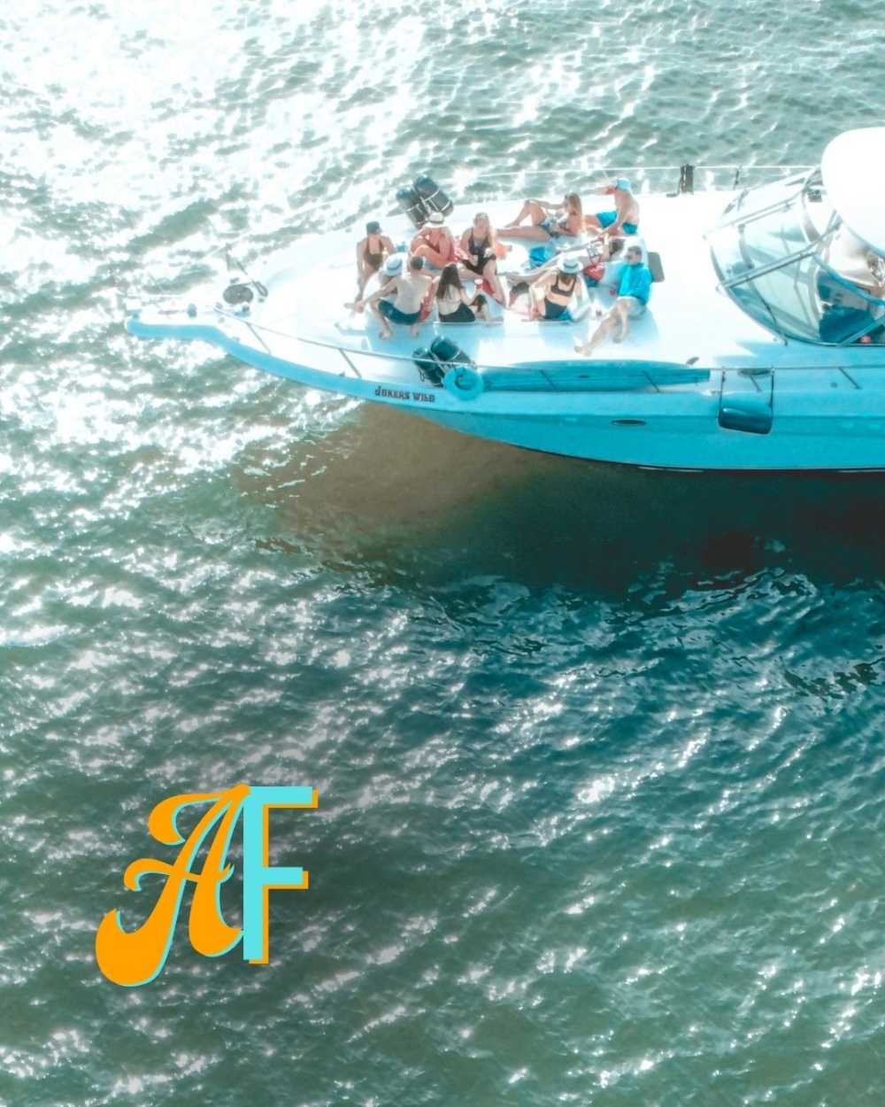 a boat with people on it is in the water. featuring Intracoastal Waterway cruises and yacht charters